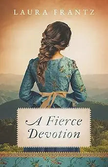 A fierce devotion blue floral dress with tied waistband worn by a woman standing outdoors