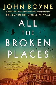 The book cover for all the broken places by John Boyne features a warm golden building under a dramatic sky with birds