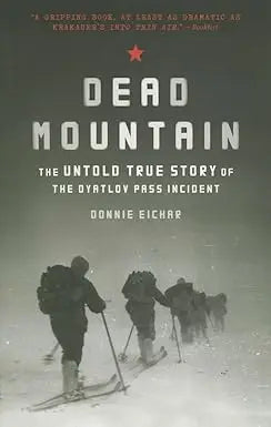Black-and-white book cover of Dead Mountain with hikers carrying skis on snowy terrain