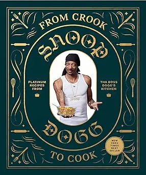 From crook to cook cookbook with ornate gold and teal cover featuring snoop dogg in white tank top holding food