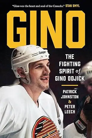 A white hockey helmet with a black copper logo from gino the fighting spirit of gino odjick product line