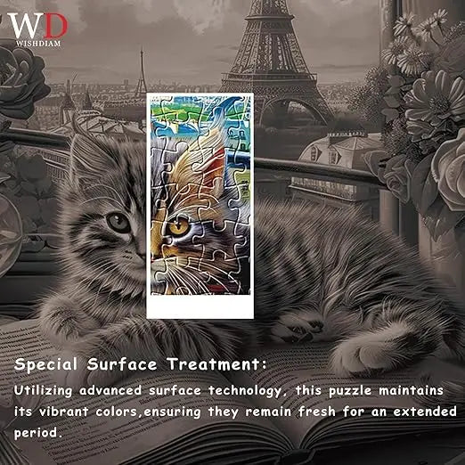 A 1000 piece jigsaw puzzle featuring a fluffy tabby kitten with yellow eyes on a book near flowers and the eiffel tower view