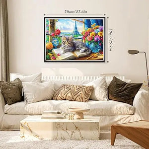 A framed 50cm x 70cm diamond painting of a tabby cat on an open book with flowers and the eiffel tower, perfect for home decor