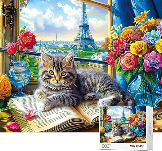 A 1000 piece jigsaw puzzle featuring a fluffy tabby kitten with yellow eyes on a book near flowers and the eiffel tower view