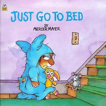 Blue bunny pajamas with a hood and pockets worn by a character on the cover of just go to bed by mercer mayer