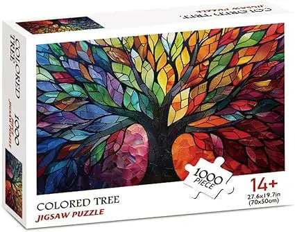 A vibrant mosaic tree of life puzzle with a black trunk and colorful stained-glass leaves in 1000 pieces for adults