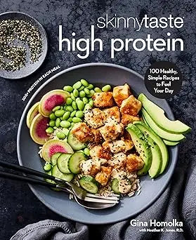 A dark gray bowl with skinnytaste high protein meal featuring green peas watermelon avocado and crispy tofu cubes