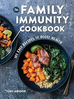 The family immunity cookbook by Toby Amidor with a dark blue bowl of orange sweet potatoes steak and leafy greens