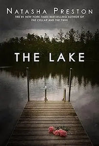 The lake book by Natasha Preston with a dark cover featuring a wooden dock and pink roses on still water