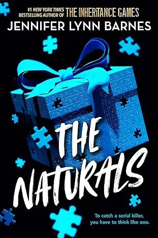 A blue puzzle-piece pattern gift box with matching ribbon bow from the naturals collection
