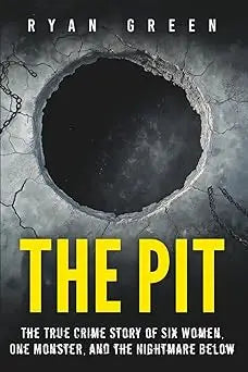 The pit by ryan green is a dark gray book with bold yellow lettering and a cracked concrete cover featuring chains