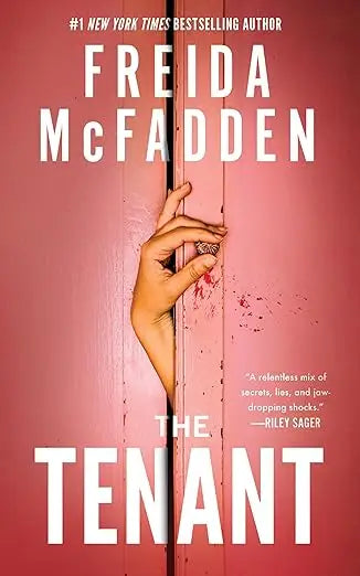 The tenant by freida mcfadden paperback book with a pink cover showing a hand gripping wooden slats and blood splatters