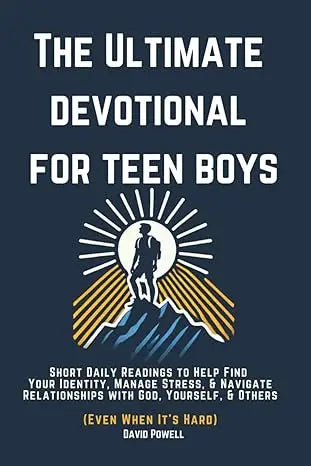 The ultimate devotional for teen boys by david powell is a navy blue book with white and gold text and a boy on a mountain illustration