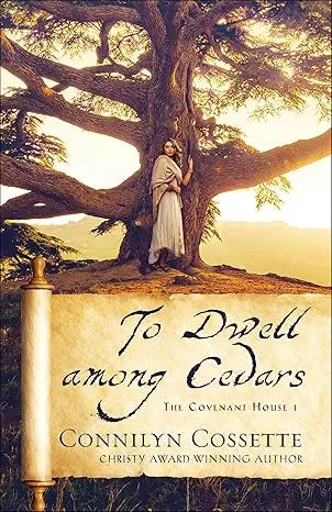 Book cover of to dwell among cedars showing a woman in a white robe beneath an ancient tree with golden text by connilyn cossette