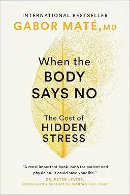 The book cover of when the body says no by gabor maté md features a golden-yellow leaf design on a white background