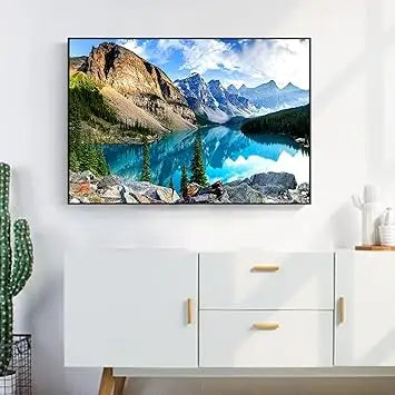 Yundu 1000 piece puzzle for adults featuring a serene turquoise lake reflecting snow-capped Moraine Lake mountains