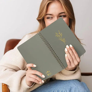 Matte olive green spiral notebook with gold foil floral design and zicero brand name from zicoto aesthetic set